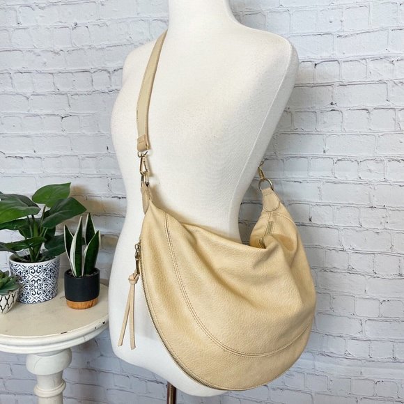 Anthropologie Handbags - anthropologie Urban Originals Half Moon Large Crossbody Bisque Vegan Leather Bag